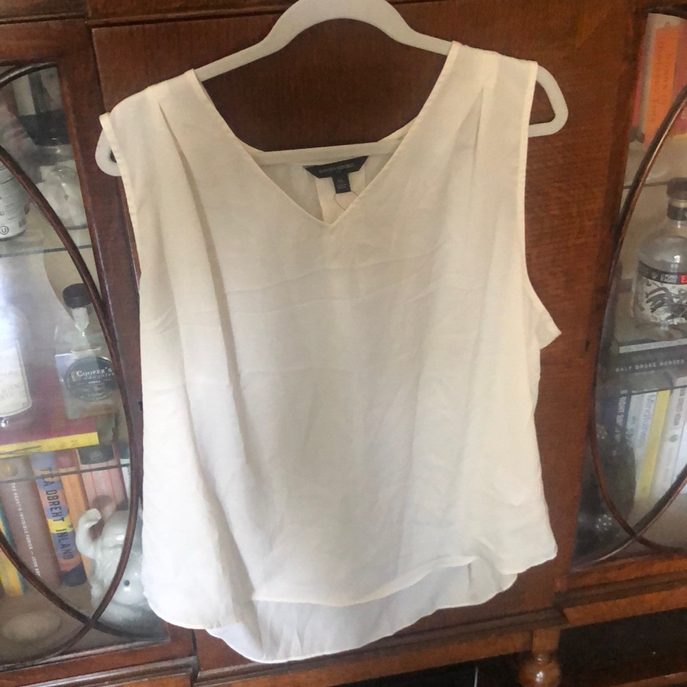 White sleeveless blouse